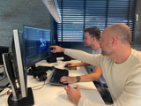 Creatieve werksessie achter de schermen bij AlienTrick